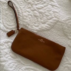 Brown coach wrist purse